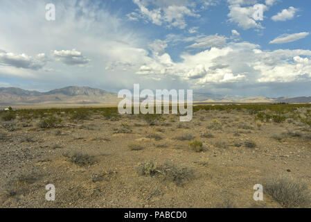 clouds in sky above Mojave Desert mountain landscape Pahrump, Nevada, USA Stock Photo