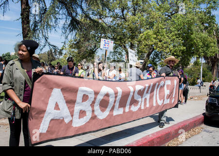 Los Angeles, USA. 21st July, 2018. Hundreds march in support for immigrant rights at the “Families Belong Together” rally at MacArthur Park in Los Angeles. Credit: Christian Monterrosa/Pacific Press/Alamy Live News Stock Photo