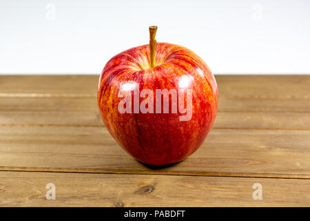 Red apples waiting to be eaten on the kitchen table Stock Photo