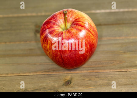 Red apples waiting to be eaten on the kitchen table Stock Photo