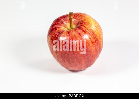 Red apples waiting to be eaten on the kitchen table Stock Photo