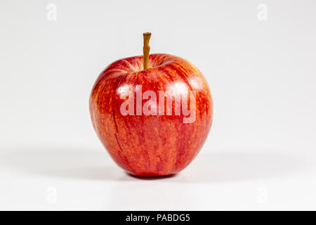 Red apples waiting to be eaten on the kitchen table Stock Photo