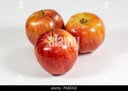 Red apples waiting to be eaten on the kitchen table Stock Photo