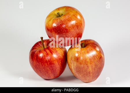 Red apples waiting to be eaten on the kitchen table Stock Photo