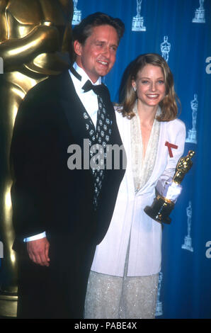 LOS ANGELES, CA - MARCH 30: Actor Michael Douglas and actress Jodie Foster attend the 64th Annual Academy Awards on March 30, 1992 at the Dorothy Chandler Pavilion in Los Angeles, California. Photo by Barry King/Alamy Stock Photo Stock Photo