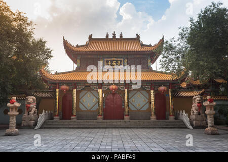 Sunset behind the Main Doors of a Temple in China Stock Photo
