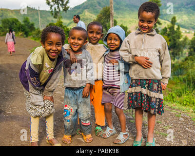 OMO, ETHIOPIA - SEPTEMBER 21, 2011: Unidentified Ethiopian children group. People in Ethiopia suffer of poverty due to the unstable situation Stock Photo