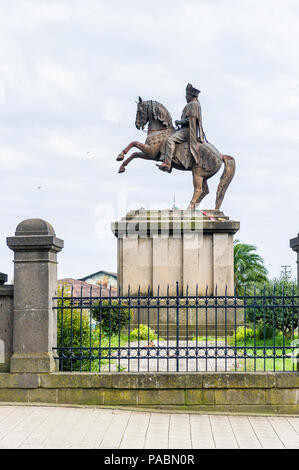 ADDIS ABABA, ETHIOPIA - SEP 29, 2011: Menelik II statue on a horse in Addis Ababa, Ethiopia. Menelik II was the emperor of Ethiopia Stock Photo