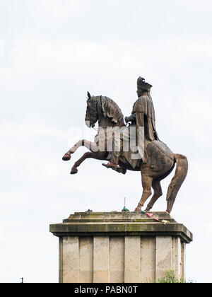 ADDIS ABABA, ETHIOPIA - SEP 29, 2011: Menelik II statue on a horse in Addis Ababa, Ethiopia. Menelik II was the emperor of Ethiopia Stock Photo