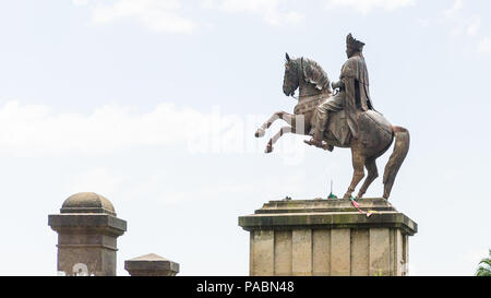 ADDIS ABABA, ETHIOPIA - SEP 29, 2011: Menelik II statue on a horse in Addis Ababa, Ethiopia. Menelik II was the emperor of Ethiopia Stock Photo