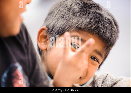 MEXICO CITY, MEXICO - DEC 29, 2011: Unidentified Mexican little boy portrait. 60% of Mexican people belong to the Mestizo ethnic group Stock Photo