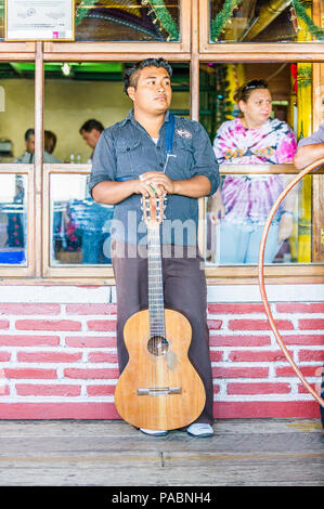 MANAGUA, NICARAGUA - JAN 6, 2012: Unidentified Nicaraguan local musician. 69% of Nicaranguan people belong to the Mestizo ethnic group Stock Photo