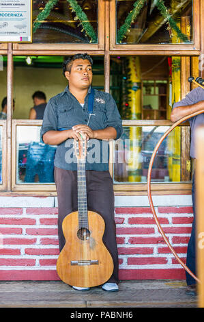 MANAGUA, NICARAGUA - JAN 6, 2012: Unidentified Nicaraguan local musician. 69% of Nicaranguan people belong to the Mestizo ethnic group Stock Photo