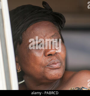 GHANA - MARCH 2, 2012: Unindentified Ghanaian woman  in Ghana, on March 2nd, 2012. People in Ghana suffer from poverty due to the slow development of  Stock Photo