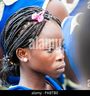ACCRA, GHANA - MARCH 2, 2012: Unidentified Ghanaian students came to see the Elmina Castle. Children of Ghana suffer of poverty due to the unstable ec Stock Photo