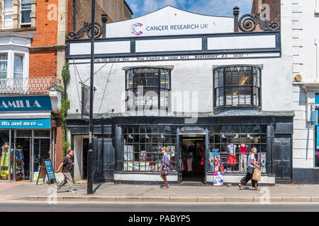 The Old George Inn on the high Street in Bridport, where King Charles II stayed on September 23rd 1651, and is now a Cancer Research outlet. Stock Photo