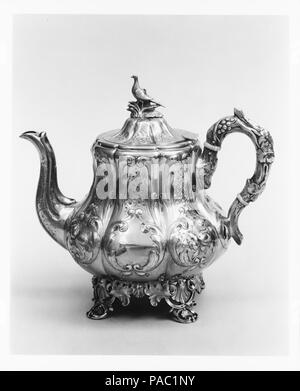 Teapot. Culture: American. Dimensions: 8 5/8 x 9 7/16 x 6 1/4 in. (21.9 x 24 x 15.9 cm); 28 oz. 15 dwt. (894.3 g). Maker: Charters, Cann & Dunn (active 1848-1854). Retailer: Ball, Tompkins and Black (active 1839-51). Date: 1848-51. Museum: Metropolitan Museum of Art, New York, USA. Stock Photo