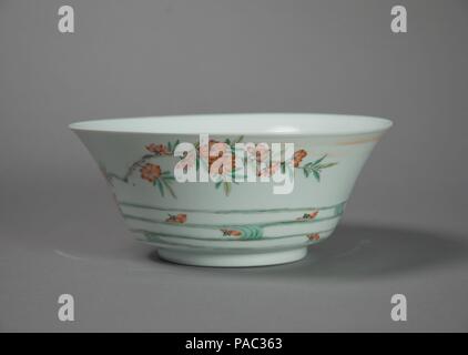 Bowl with Flowers and Waves. Culture: China. Dimensions: Diam. 8 1/4 in. (21 cm). Date: late 17th-early 18th century.  The six Chinese characters on the bottom of this bowl read "made during the reign of the Chenghua Emperor." Although the Chenghua Emperor ruled from 1467 to 1487, this particular bowl was made several centuries later. Chinese porcelains are sometimes inscribed with earlier dates; these can be read as both an act of respect toward past traditions and a statement of quality. Museum: Metropolitan Museum of Art, New York, USA. Stock Photo