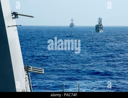 160308-N-GW139-208 WATERS NEAR GUAM (Mar. 8, 2016) - Japan Maritime Self-Defense Force (JMSDF) ship JS Amagiri (DD 154), front, and Arleigh Burke-class guided missile destroyer USS McCampbell (DDG 85) steam behind Arleigh Burke-class guided missile destroyer USS Fitzgerald (DDG 62) during Multi Sail 2016. Multi Sail is a bilateral training exercise aimed at interoperability between the U.S. and Japanese forces. This exercise builds interoperability and benefits from realistic, shared training, enhancing our ability to work together to confront any contingency. (U.S. Navy photo by Mass Communic Stock Photo