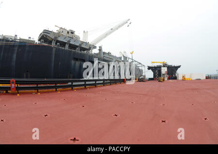 The USNS Montford Point, an Expeditionary Transfer Dock, floats off the ...