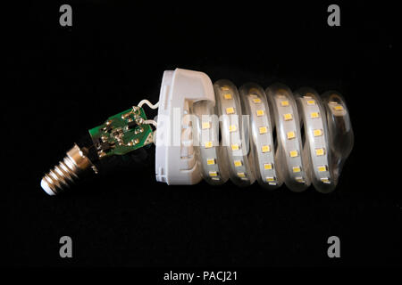 LED bulb in spiral open and showing the circuit. Stock Photo