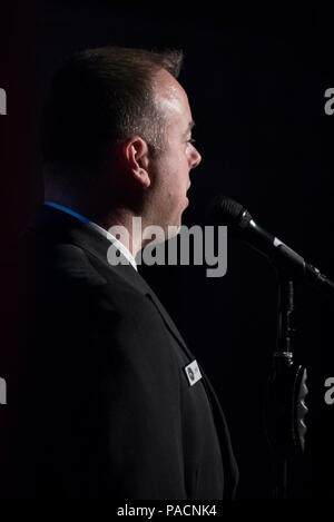 MORGANTOWN, W.Va. (April 18 2017) Musician 1st Class Michael Webb, emcee for the Sea Chanters chorus, speaks to the audience during a performance at the Metropolitan Theatre in Morgantown. The Sea Chanters are on a 21-day tour of the midwestern United States connecting communities across the United States to their Navy. Stock Photo