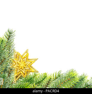 Christmas composition green with fir branches and golden star isolated on a white background, with space for text Stock Photo