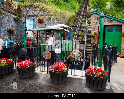 Passengers alighting from the Lynmouth end of the 1888 Lynton to Lynmouth cliff railway. Stock Photo