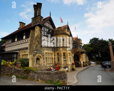 Arts and Crafts building mixing half timbered and stonework construction of Lynton town hall, Devon, UK Stock Photo