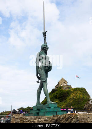 Damian Hirst sculpture 'Verity' dominates the harbour wall at Ilfracombe, North Devon, UK Stock Photo
