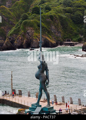 Damian Hirst sculpture 'Verity' dominates the harbour wall at Ilfracombe, North Devon, UK Stock Photo