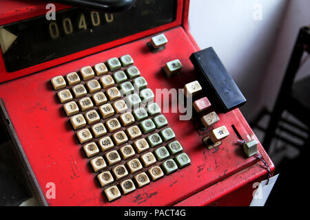 Red old-time cash register, close-up Stock Photo