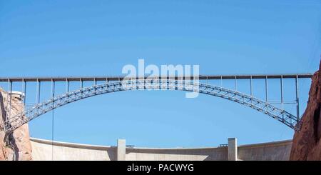 Arizona, USA. 1st June, 2018. The steel arch Glen Canyon Dam Bridge in Arizona, carries U.S. Route 89 across the Colorado River adjacent to the Glen Canyon Dam. It is one of the highest bridges in the U.S., 700 feet (210 m) above the river, and its two lanes are an overall length of 1,271 feet (387 m) and used regularly by tourists. Credit: Arnold Drapkin/ZUMA Wire/Alamy Live News Stock Photo