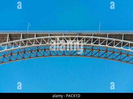 Arizona, USA. 1st June, 2018. The steel arch Glen Canyon Dam Bridge in Arizona, carries U.S. Route 89 across the Colorado River adjacent to the Glen Canyon Dam. It is one of the highest bridges in the U.S., 700 feet (210 m) above the river, and its two lanes are an overall length of 1,271 feet (387 m) and used regularly by tourists. Credit: Arnold Drapkin/ZUMA Wire/Alamy Live News Stock Photo