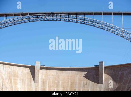 Arizona, USA. 1st June, 2018. The steel arch Glen Canyon Dam Bridge in Arizona, carries U.S. Route 89 across the Colorado River adjacent to the Glen Canyon Dam. It is one of the highest bridges in the U.S., 700 feet (210 m) above the river, and its two lanes are an overall length of 1,271 feet (387 m) and used regularly by tourists. Credit: Arnold Drapkin/ZUMA Wire/Alamy Live News Stock Photo