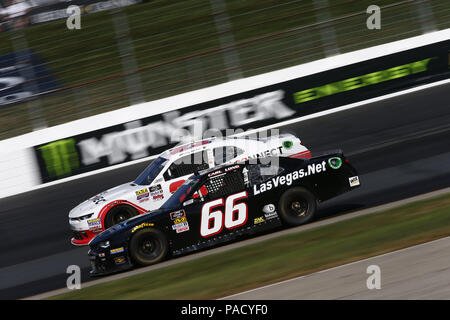 Loudon, New Hampshire, USA. 21st July, 2018. Johnny Sauter (23) battles for position during the Lakes Region 200 at New Hampshire Motor Speedway in Loudon, New Hampshire. Credit: Justin R. Noe Asp Inc/ASP/ZUMA Wire/Alamy Live News Stock Photo