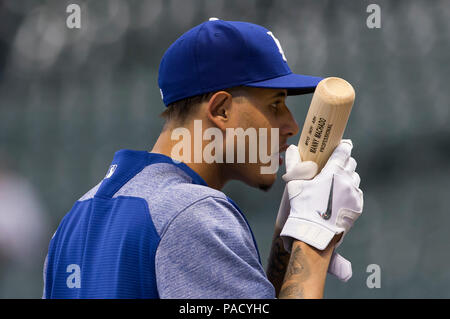 Milwaukee, WI, USA. 20th July, 2018. Los Angeles Dodgers shortstop Manny  Machado #8 is all smiles as he joins his new team just after the All-Star  break. Machado is seen here during