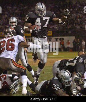 Dec. 9, 2012 - Tampa, Florida, U.S. - Tampa Bay Buccaneers 2002 Superbowl  team members Warren Sapp (front left), Mike Alstott (center) and Dwight  Smith (right) check out their old friend, the