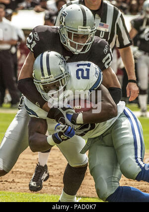 Dallas Cowboys running back Julius Jones gets hit by New York Giants  defender Curtis Deloatch in week 13 at Giants Stadium in East Rutherford,  New Jersey on December 4, 2005. The New