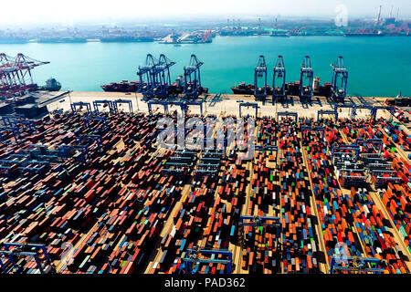 Beijing, China. 4th May, 2018. Aerial photo taken on May 4, 2018 shows an automatic container dock in Qingdao, east China's Shandong Province. Credit: Guo Xulei/Xinhua/Alamy Live News Stock Photo