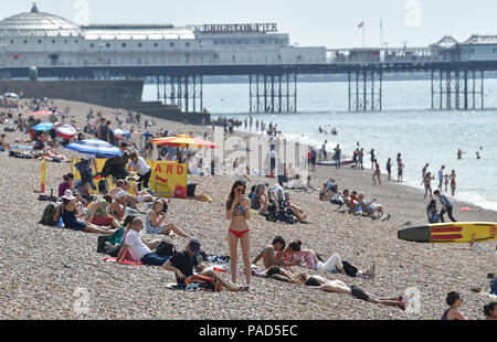 Brighton UK 22nd July 2018 - Brighton beach is busy as the heatwave weather continues throughout parts of Britain Credit: Simon Dack/Alamy Live News Credit: Simon Dack/Alamy Live News Stock Photo