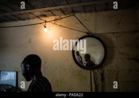 Nijar, Spain. 21st July, 2018. 21.07.2018, Spain, Almería, Nijar: African undocumented migrants are living in huts at Nijar, Almeria, Spain. Over 50 african undocumented migrants live in poor conditions while hoping to get some work on the nearby plantations. Most of them have travelled from Italy after fleing Libya in dinguies. Credit: Javier Fergo/dpa/Alamy Live News Stock Photo
