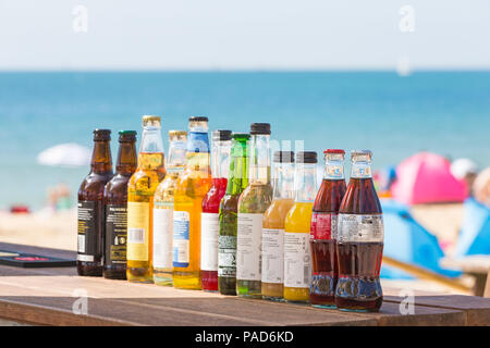 Bournemouth, Dorset, UK. 22nd July 2018. UK weather: hot and sunny at Bournemouth beaches, as sunseekers head to the seaside to soak up the sun. Bottles of drinks on a bar at the seaside. Credit: Carolyn Jenkins/Alamy Live News Stock Photo