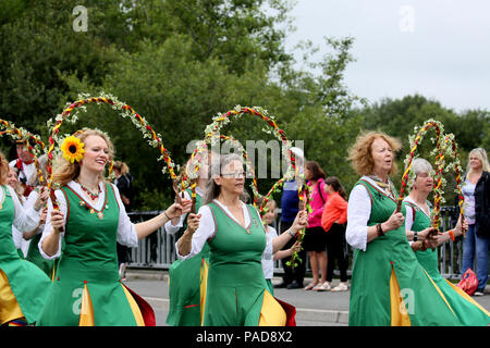 Littleborough, UK. 22nd July, 2018. Chelmsford Morris Green join the annual Rushbearing festival reviving the tradition of carrying the rushes to the local church dating back to a time when the church floors where earthen and the rushes were used to cover them for insulation. Littleborough,22nd July, 2018 (C)Barbara Cook/Alamy Live News Credit: Barbara Cook/Alamy Live News Stock Photo