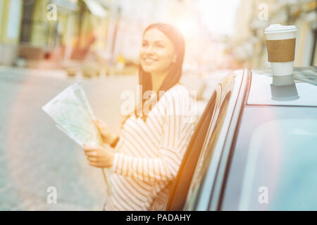 Beautiful woman having a short coffee break Stock Photo