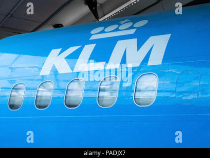 AMSTERDAM, NETHERLANDS - JULY 18, 2018: Close up of KLM Royal Dutch Airlines plane with windows Stock Photo