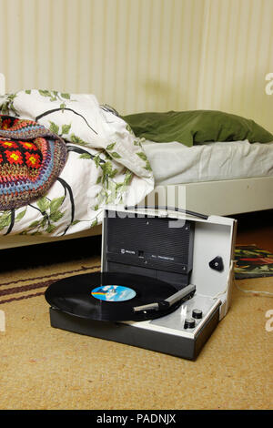 record player with record in bedroom setting Stock Photo