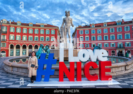 France, city of Nice, Fountain of the Sun (Fontaine du Soleil) with Apollo statue at Place Massena square, # I Love Nice installation Stock Photo