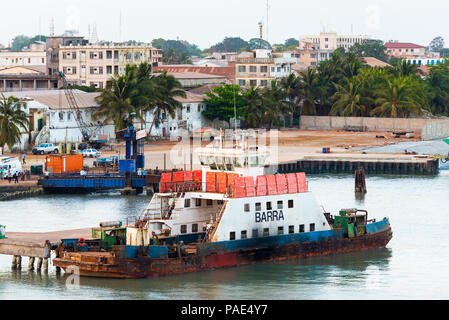 BANJUL, GAMBIA - MAR 14, 2013: Port of Banjul in Gambia, Mar 14, 2013. Major ethnic group in Gambia is the Mandinka - 42% Stock Photo