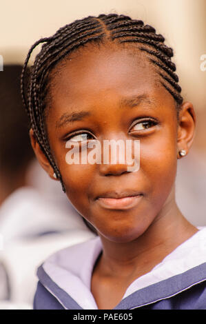 ACCRA, GHANA - MARCH 4, 2013: Portrait of a student from one of the Ghanaian schools wearing special uniform in Ghana, Mar 4, 2013. This uniform is on Stock Photo